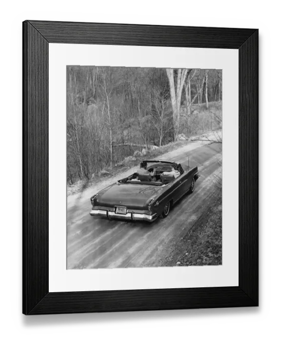 Framed Print : Family driving in convertible along country road Framed Print : Family driving in convertible along country road