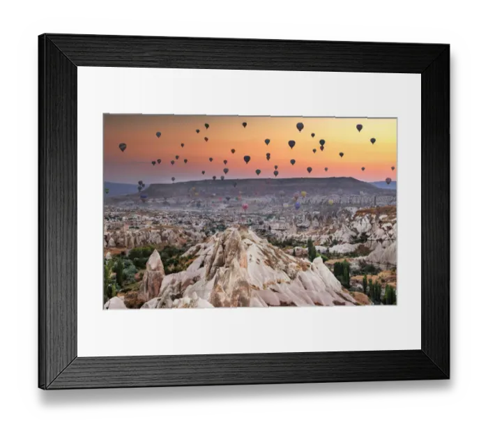 Framed Print : Hot air balloon flying over rock landscape at Capp Framed Print : Hot air balloon flying over rock landscape at Capp