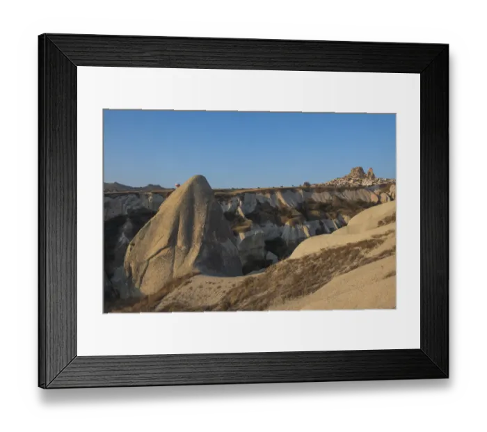 Framed Print : Hot air balloon flying over rock landscape at Cappadocia Turkey Framed Print : Hot air balloon flying over rock landscape at Cappadocia Turkey