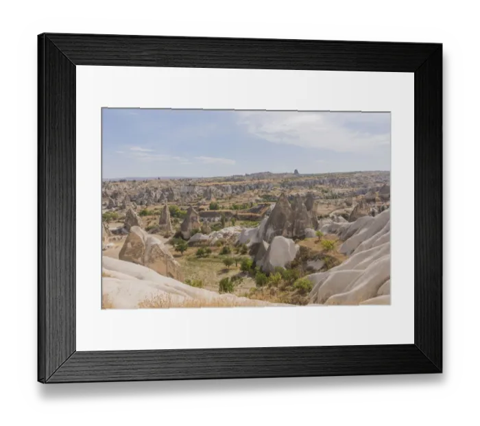 Framed Print : Ancient town and a castle of Uchisar dug from a mountains Framed Print : Ancient town and a castle of Uchisar dug from a mountains
