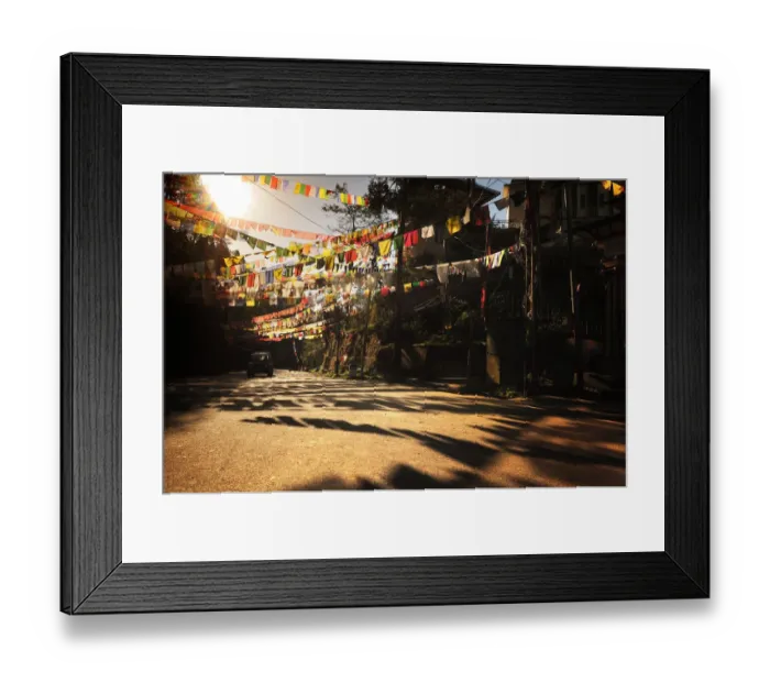 Framed Print : Bunting. Colorful bunting on street with sunlight Framed Print : Bunting. Colorful bunting on street with sunlight