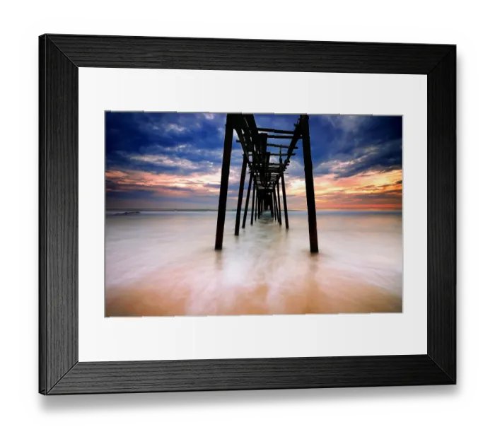 Framed Print : Seascape with old broken pier against dramatic sky Framed Print : Seascape with old broken pier against dramatic sky