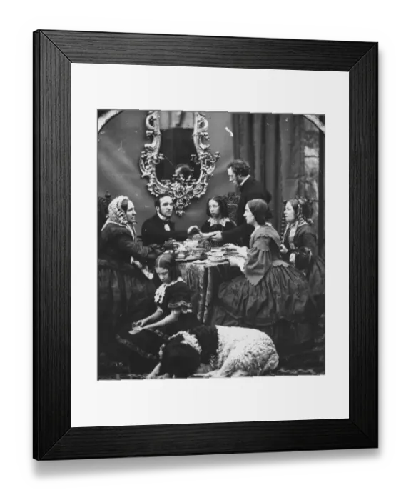 Framed Print : Tea Time. circa 1865: A middle class family take tea while a St Bernard Framed Print : Tea Time. circa 1865: A middle class family take tea while a St Bernard