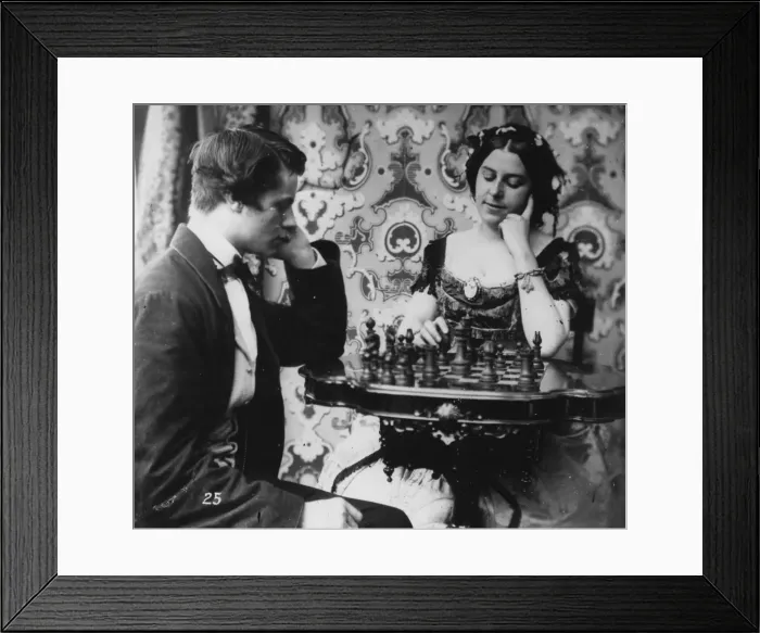 Framed Print : Checkmate. circa 1865: A young man waits for a young woman to make her move at chess