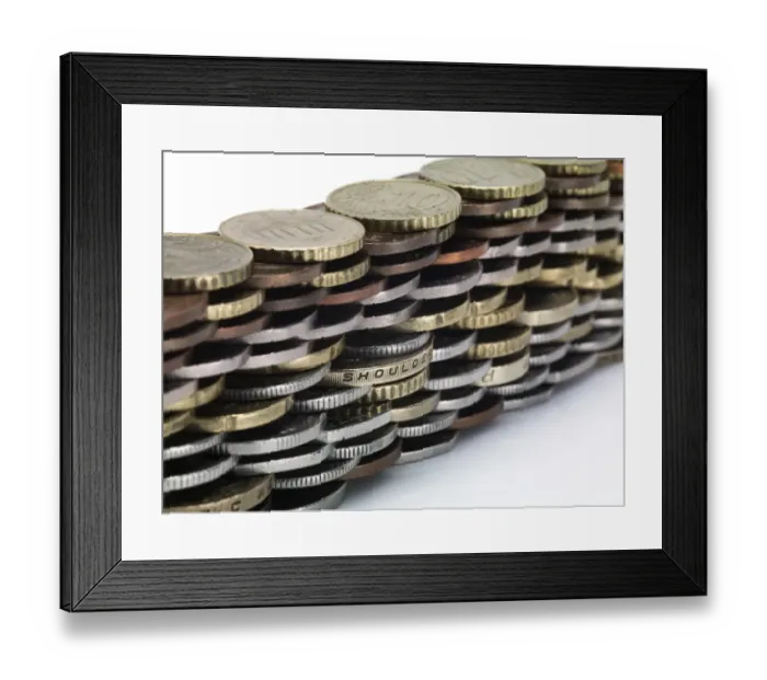 Framed Print : Coins stacked to form a wall Framed Print : Coins stacked to form a wall