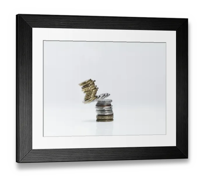 Framed Print : Stacked coins falling Framed Print : Stacked coins falling