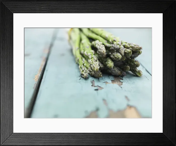 Framed Print : Asparagus photographed against a painted green wood background Framed Print : Asparagus photographed against a painted green wood background