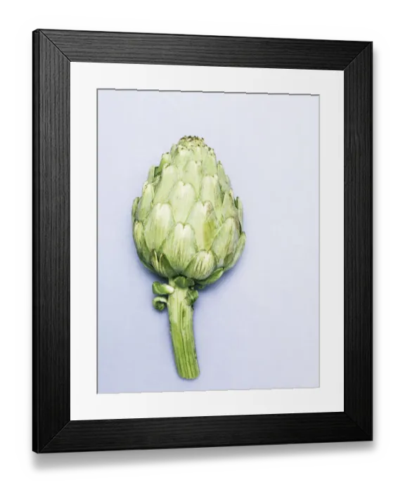 Framed Print : Artichoke fotographed from a top angle against a light blue background