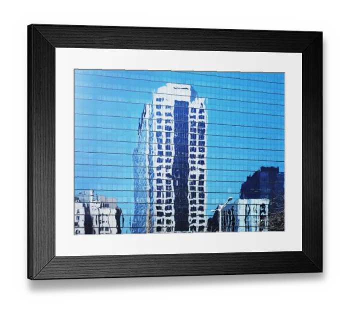 Framed Print : Cityscape reflected in glass facade of building Framed Print : Cityscape reflected in glass facade of building