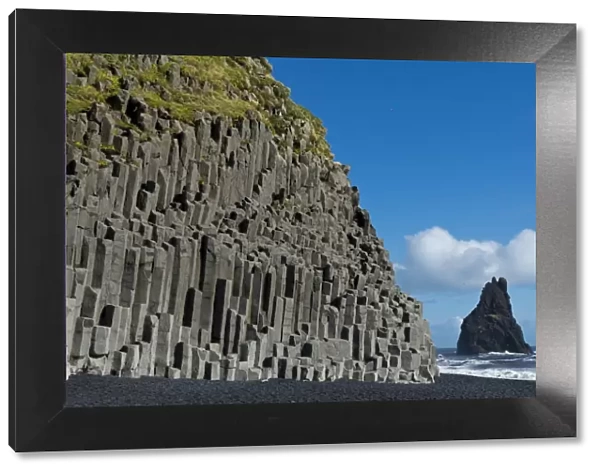 Basalt columns, Reynisfjara beach and one Reynisdrangar Pinnacle, near Vik i Myrdal, South Coast, Iceland