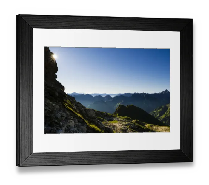 Framed Print : Peaks of the Allgau Alps in steplike arrangement in the early morning with a sun star, Oberstdorf, Bavaria, Germany Framed Print : Peaks of the Allgau Alps in steplike arrangement in the early morning with a sun star, Oberstdorf, Bavaria, Germany