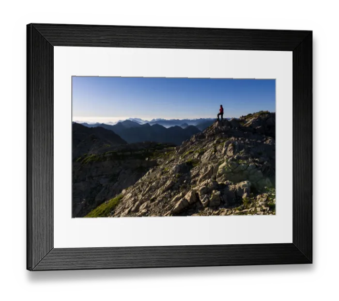 Framed Print : Peaks of the Allgau Alps in the early morning with a hiker, Oberstdorf, Bavaria, Germany Framed Print : Peaks of the Allgau Alps in the early morning with a hiker, Oberstdorf, Bavaria, Germany