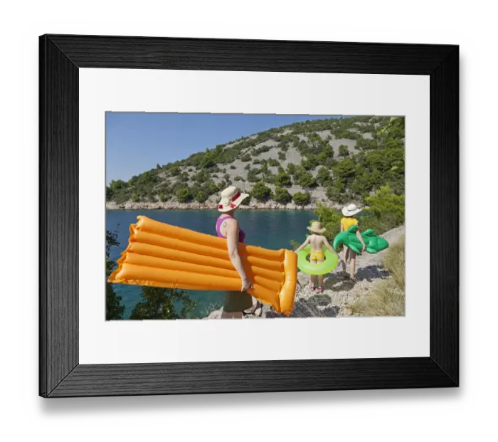 Framed Print : Woman and children on their way to the beach in a bay, near Donja Klada, Kvarner Gulf, Croatia Framed Print : Woman and children on their way to the beach in a bay, near Donja Klada, Kvarner Gulf, Croatia
