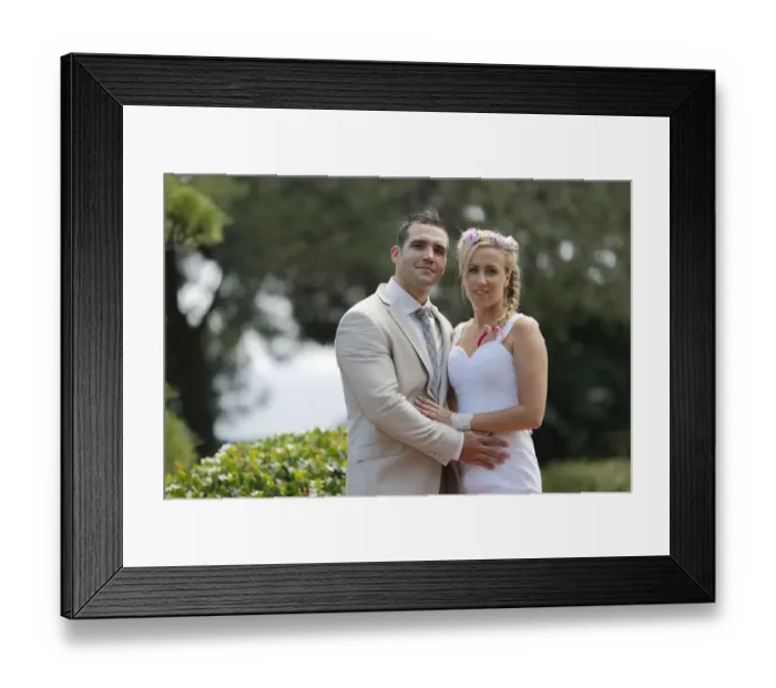Framed Print : Bride and groom posing in a park Framed Print : Bride and groom posing in a park