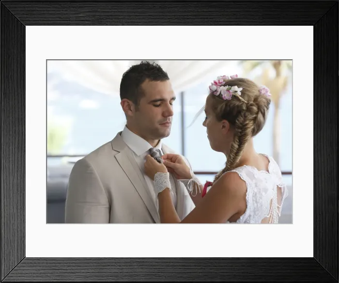 Framed Print : Bride adjusting the grooms tie Framed Print : Bride adjusting the grooms tie