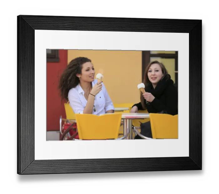 Framed Print : Two girlfriends, teenagers, eating ice cream from cones on the terrace an ice cream parlour, Menton, Alpes-Maritimes, Provence-Alpes-Cote dAzur, France Framed Print : Two girlfriends, teenagers, eating ice cream from cones on the terrace an ice cream parlour, Menton, Alpes-Maritimes, Provence-Alpes-Cote dAzur, France