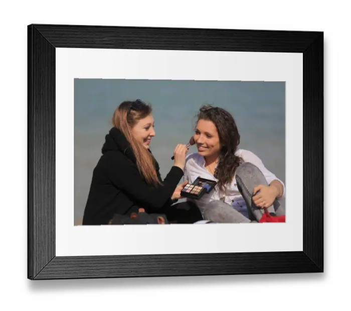 Framed Print : Two girlfriends, teenagers, sitting on the beach, applying makeup on each other, Menton, Alpes-Maritimes, Provence Alpes, France Framed Print : Two girlfriends, teenagers, sitting on the beach, applying makeup on each other, Menton, Alpes-Maritimes, Provence Alpes, France