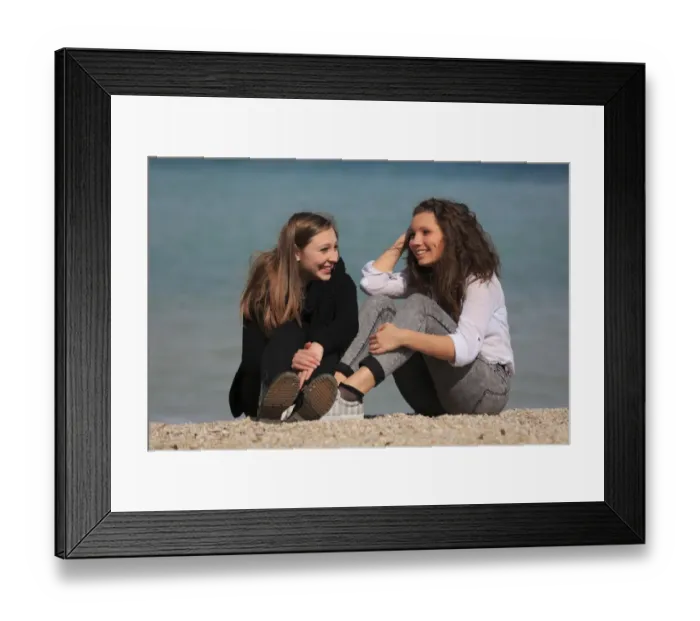 Framed Print : Two girlfriends, teenagers, sitting on the beach, Menton, Alpes-Maritimes, Provence Alpes, France Framed Print : Two girlfriends, teenagers, sitting on the beach, Menton, Alpes-Maritimes, Provence Alpes, France