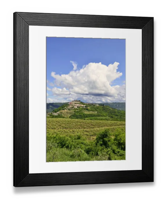 Framed Print : View across vineyards to the town with atmospheric clouds, Motovun, Montona, Mirna Valley, Istria, Croatia Framed Print : View across vineyards to the town with atmospheric clouds, Motovun, Montona, Mirna Valley, Istria, Croatia