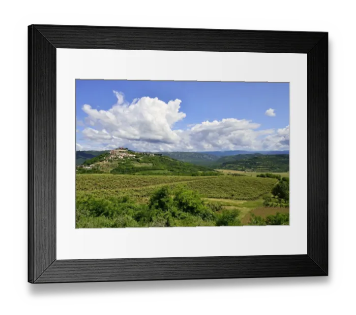 Framed Print : View across vineyards to the town with atmospheric clouds, Motovun, Montona, Mirna Valley, Istria, Croatia Framed Print : View across vineyards to the town with atmospheric clouds, Motovun, Montona, Mirna Valley, Istria, Croatia