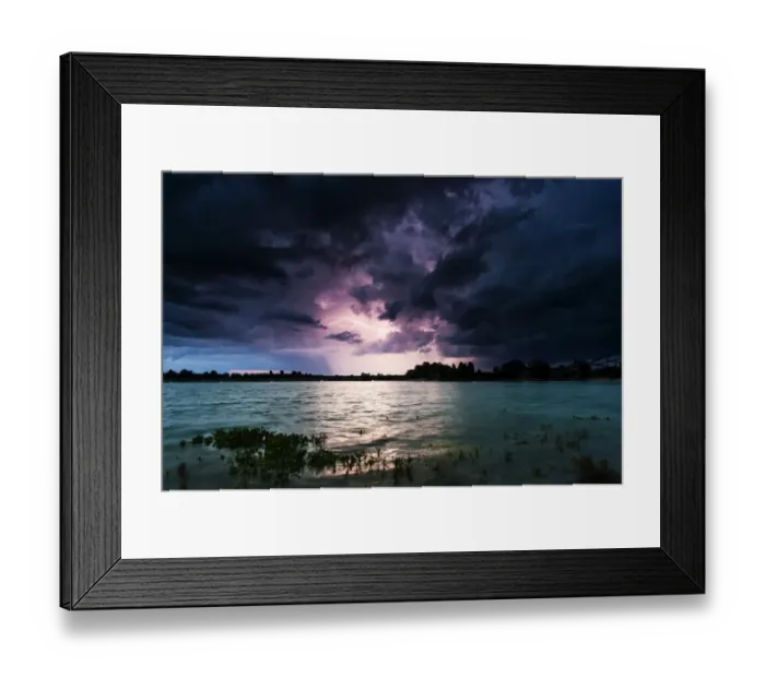 Framed Print : Storm clouds over a quarry lake with water plants, near Mindelheim, Unterallgau, Allgau, Bavaria, Germany Framed Print : Storm clouds over a quarry lake with water plants, near Mindelheim, Unterallgau, Allgau, Bavaria, Germany