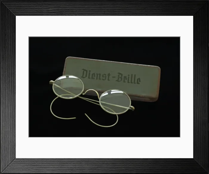 Framed Print : Service glasses from 1938 with a sheet metal case on black Framed Print : Service glasses from 1938 with a sheet metal case on black