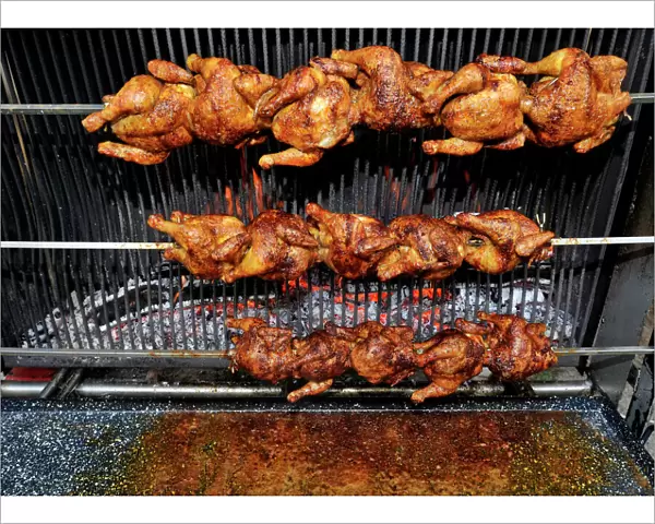 BBQ grilled chicken, chicken on rotating skewers