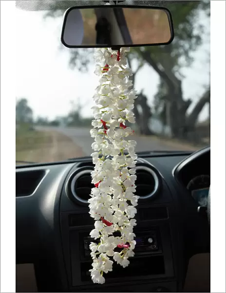 Garland of jasmine flowers hanging on the rearview mirror of a car, Karnataka, South India, India, South Asia, Asia