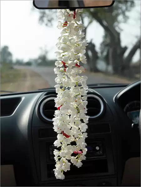 Garland of jasmine flowers hanging on the rearview mirror of a car, Karnataka, South India, India, South Asia, Asia