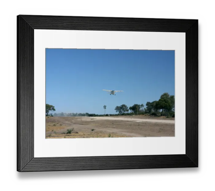 Framed Print : Cessna in approach for a landing, the Okavango Delta, Botswana, Africa Framed Print : Cessna in approach for a landing, the Okavango Delta, Botswana, Africa