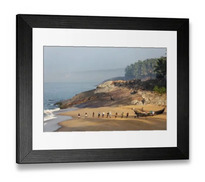 Framed Print : Fishermen pulling in a net, beach south of Kovalam, Vizhinjam in the distance, Malabar Coast, Malabar, Kerala, southern India, India, Asia Framed Print : Fishermen pulling in a net, beach south of Kovalam, Vizhinjam in the distance, Malabar Coast, Malabar, Kerala, southern India, India, Asia