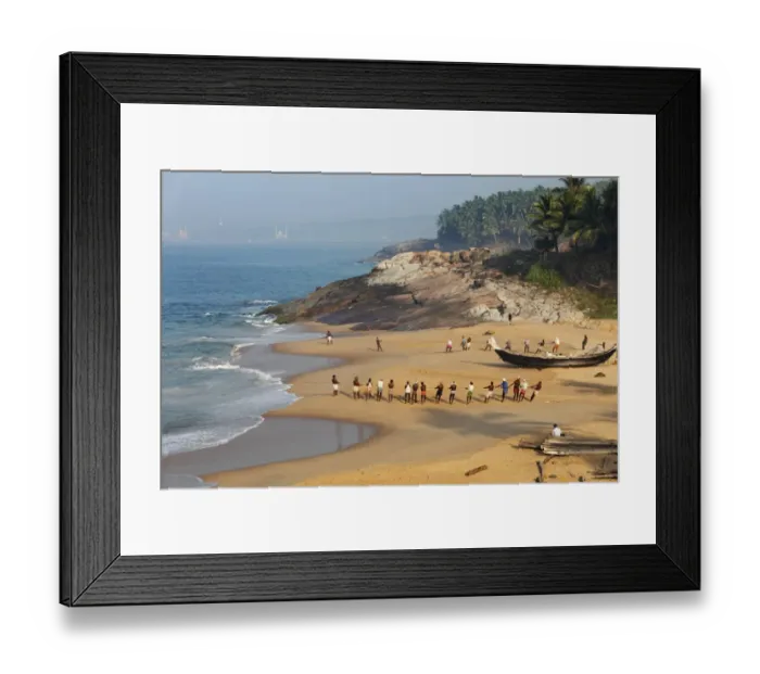 Framed Print : Fishermen pulling in a net, beach south of Kovalam, Vizhinjam in the distance, Malabar Coast, Malabar, Kerala, southern India, India, Asia Framed Print : Fishermen pulling in a net, beach south of Kovalam, Vizhinjam in the distance, Malabar Coast, Malabar, Kerala, southern India, India, Asia