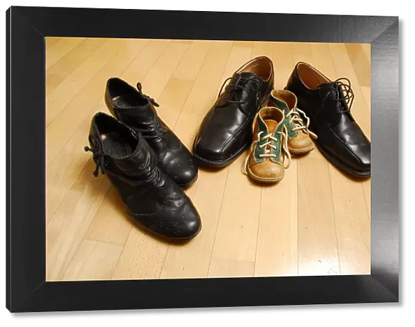 Shoes of a family, symbolic image for family