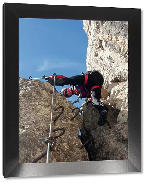 Climber on the Masara-Corda Rossa via ferrata, Dolomites, South Tyrol, Italy, Europe