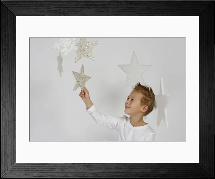 Framed Print : Child, boy wearing an angel costume with stars, Christmas, festive season Framed Print : Child, boy wearing an angel costume with stars, Christmas, festive season