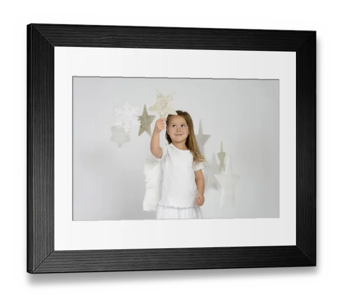 Framed Print : Child, girl wearing an angel costume with stars, Christmas, festive season Framed Print : Child, girl wearing an angel costume with stars, Christmas, festive season
