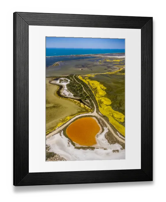 Framed Print : Salt patterns on the surface of salt marshes, brackish water area with colourful old salines, near Aigues-Mortes, Saintes-Maries-de-la-Mer, Camargue, Provence-Alpes-Cote dAzur, France