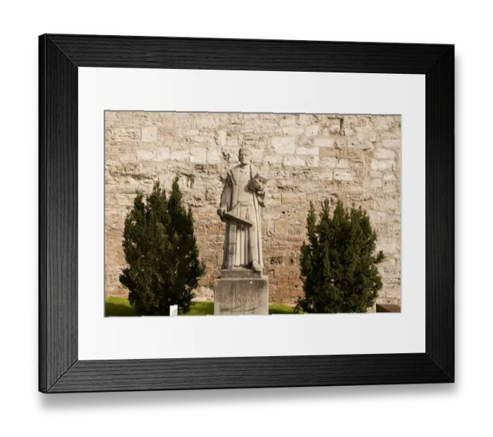 Framed Print : Statue of the preacher Thomas Muntzer in front of the city walls of Muhlhausen, Unstrut Hainich district, Thuringia, Germany Framed Print : Statue of the preacher Thomas Muntzer in front of the city walls of Muhlhausen, Unstrut Hainich district, Thuringia, Germany