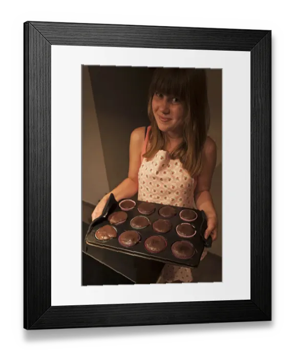 Framed Print : Girl presenting her homemade Oreo brownie cupcakes Framed Print : Girl presenting her homemade Oreo brownie cupcakes
