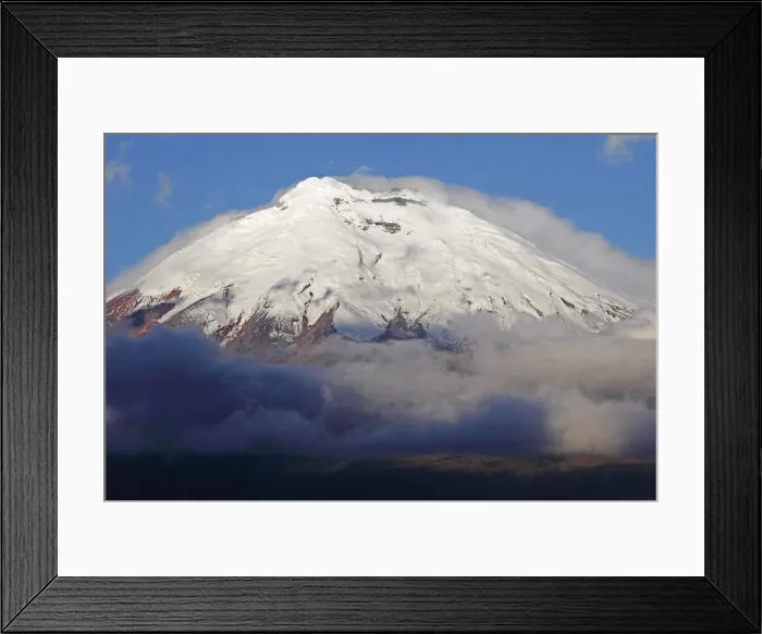 Framed Print : Snow-covered summit of Cotopaxi volcano rising from a cloud cover, Cotopaxi Province, Ecuador Framed Print : Snow-covered summit of Cotopaxi volcano rising from a cloud cover, Cotopaxi Province, Ecuador