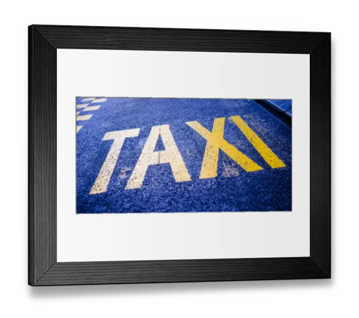 Framed Print : Taxi marking on a traffic lane