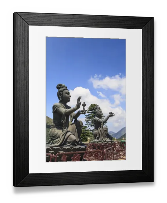 Framed Print : Statues of Devas making offerings at Tian Tan Buddha image at Po Lin Monastery, Lantau Island, Hong Kong, China Framed Print : Statues of Devas making offerings at Tian Tan Buddha image at Po Lin Monastery, Lantau Island, Hong Kong, China