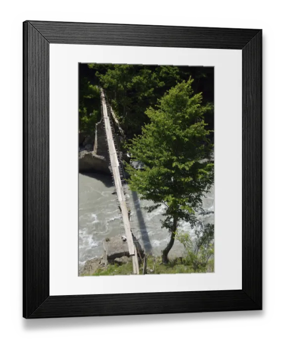 Framed Print : Simple suspension bridge over the Enguri river, Svaneti or Svanetia, Caucasus Mountains, Georgia Framed Print : Simple suspension bridge over the Enguri river, Svaneti or Svanetia, Caucasus Mountains, Georgia