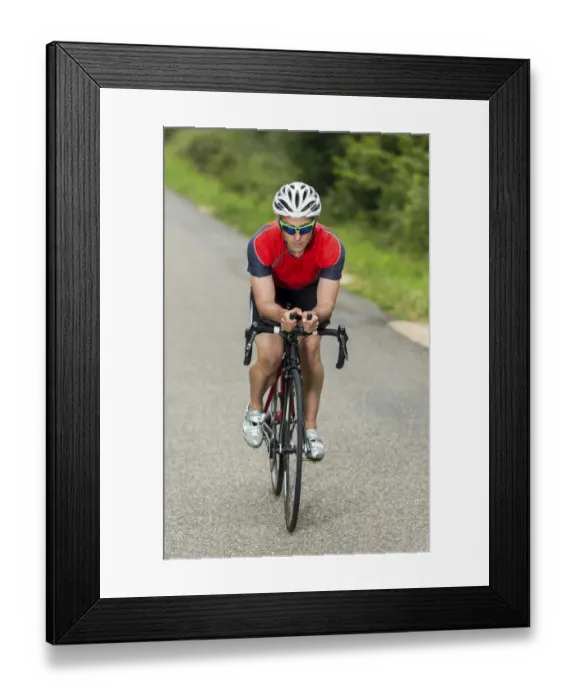 Framed Print : Triathlete, 45 years, cycling, Kaiserstrassle road, Baden-Wurttemberg, Germany Framed Print : Triathlete, 45 years, cycling, Kaiserstrassle road, Baden-Wurttemberg, Germany