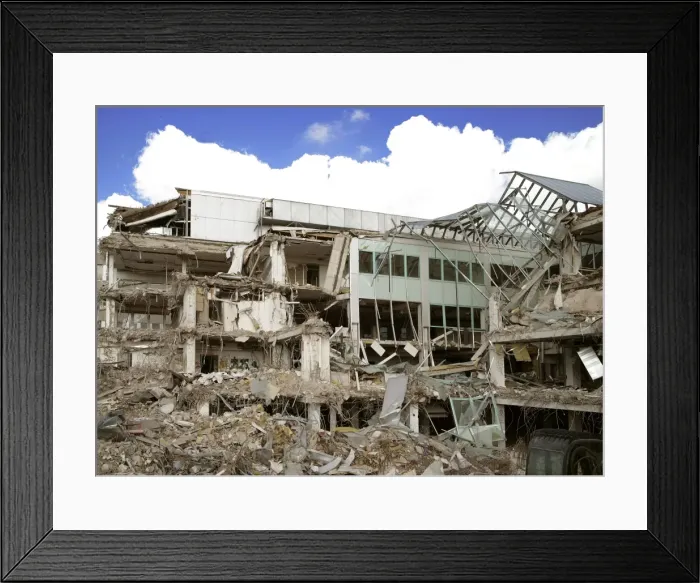 Framed Print : Demolition of a commercial building