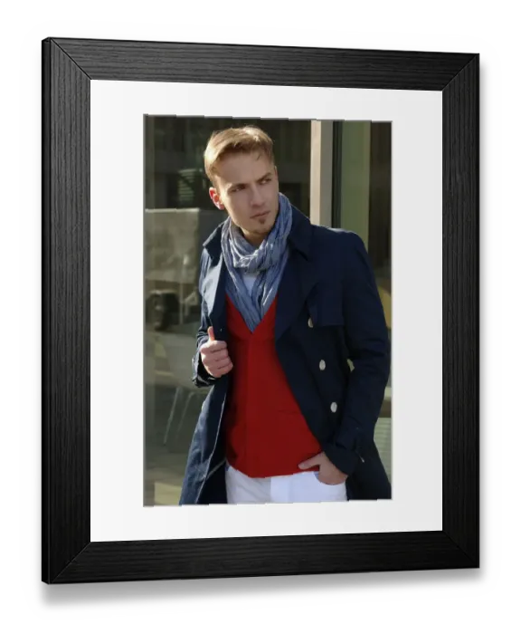 Framed Print : Fashion image, young man wearing a blue coat and a red sweater Framed Print : Fashion image, young man wearing a blue coat and a red sweater