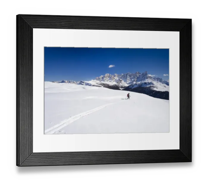 Framed Print : Ski tourer descending Mt Cima Bocche, above Passo Valles, Pala group in the back, Dolomites, Trentino, Italy, Europe Framed Print : Ski tourer descending Mt Cima Bocche, above Passo Valles, Pala group in the back, Dolomites, Trentino, Italy, Europe