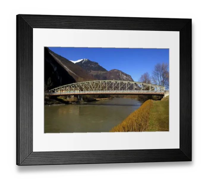 Framed Print : Broadside of a steel bridge crossing Rhone River, near Chessel, Vaud, Switzerland, Europe