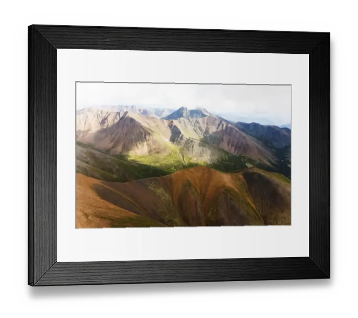 Framed Print : Aerial of mineral-rich Northern Mackenzie Mountains, Peel Watershed, Yukon Territory, Canada Framed Print : Aerial of mineral-rich Northern Mackenzie Mountains, Peel Watershed, Yukon Territory, Canada
