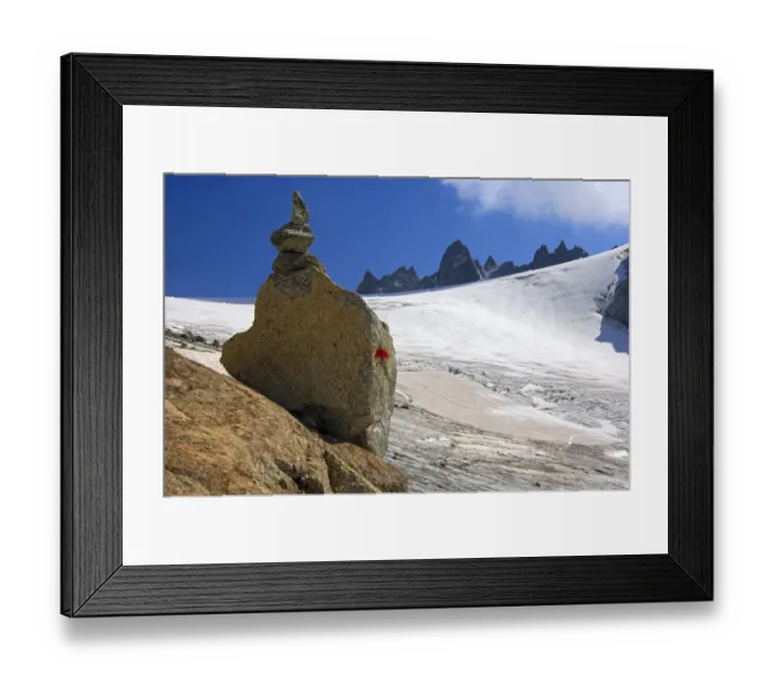 Framed Print : Steinmaennl, cairn made of stacked stones as a signpost on the edge of Orny Glacier in the Valais Alps, Switzerland, Europe Framed Print : Steinmaennl, cairn made of stacked stones as a signpost on the edge of Orny Glacier in the Valais Alps, Switzerland, Europe